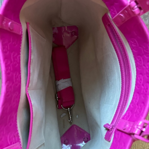 Michael Kors bright pink, has handles and also strap that comes off. - Picture 3 of 8